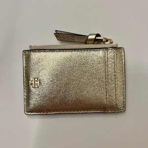 gold Tory Burch coin/card holder with pockets and zipper